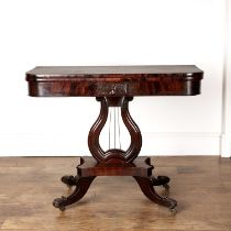 Mahogany tea table 19th Century, with a swivel top, a lyre column and on carved supports, 92cm