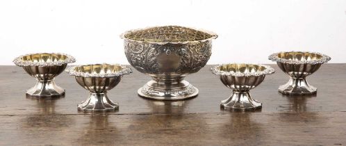 Collection of silver comprising: a set of four Georgian silver salts, with gilded interiors, of