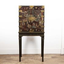 Coromandel lacquered cabinet on stand 18th Century in the Chinese taste, two doors opening to reveal