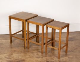 Heals style oak, nest of three tables, with square tops, the largest table measures 34cm wide x 49cm