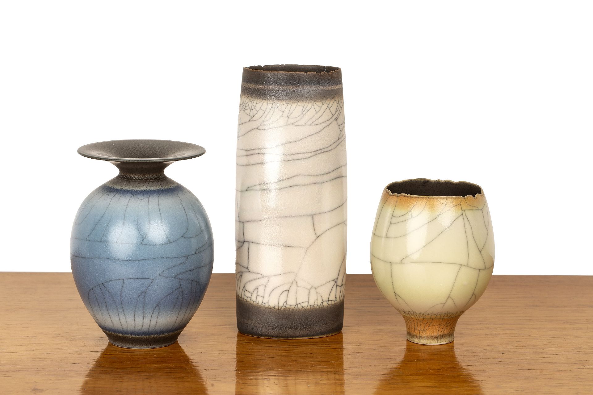 David White (1934-2011) Three pieces of studio ceramics, porcelain with crackle glaze, the tallest