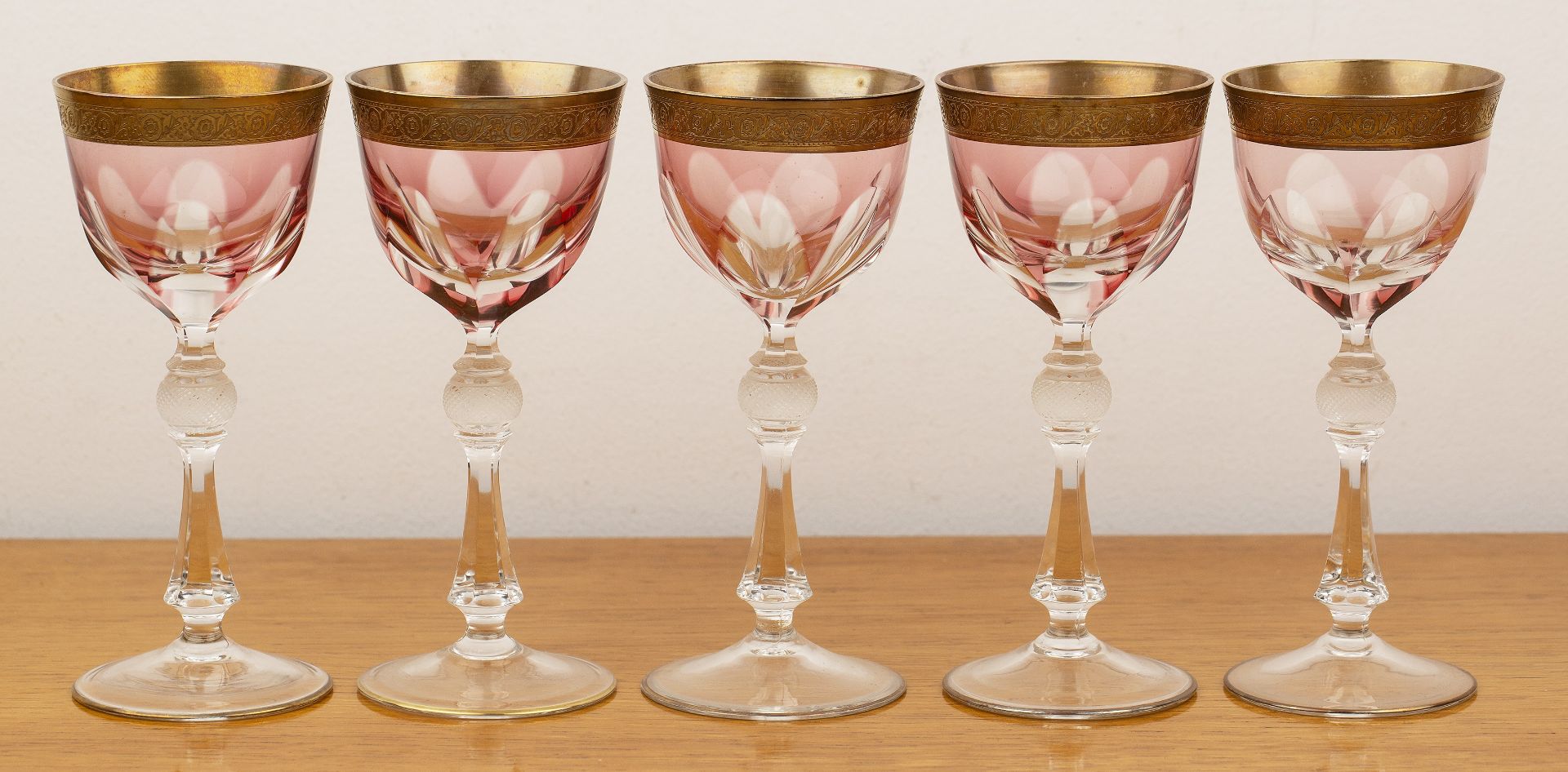 Set of five Bohemian wine glasses with faceted flashed bowl, gilt rim, with etched stem, unmarked, - Image 2 of 2