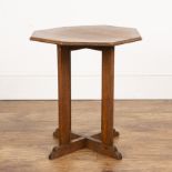 In the manner of Heals oak, occasional table with octagonal top, on crossover base, 47.5cm wide x