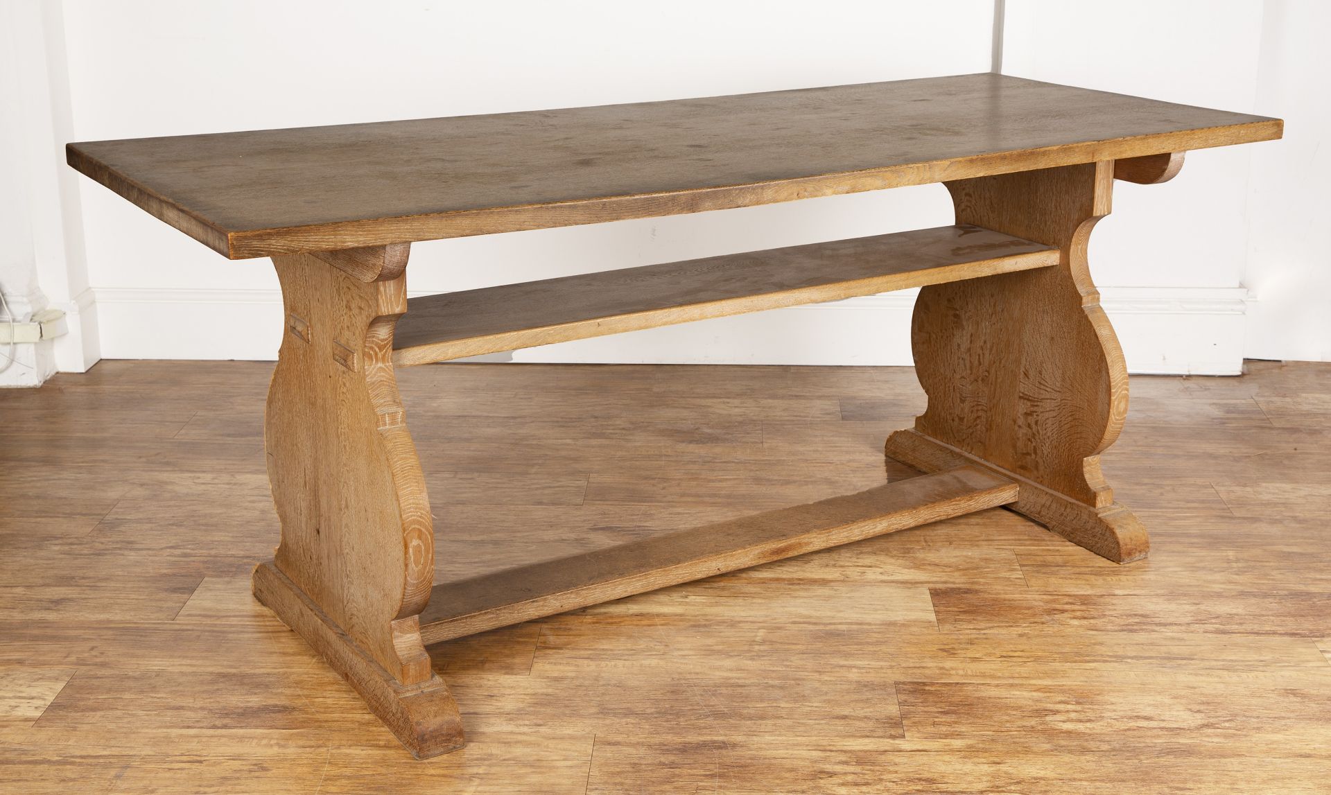 Heals oak, dining or centre table, on lyre-shaped supports, unmarked, 183cm wide x 76cm high x