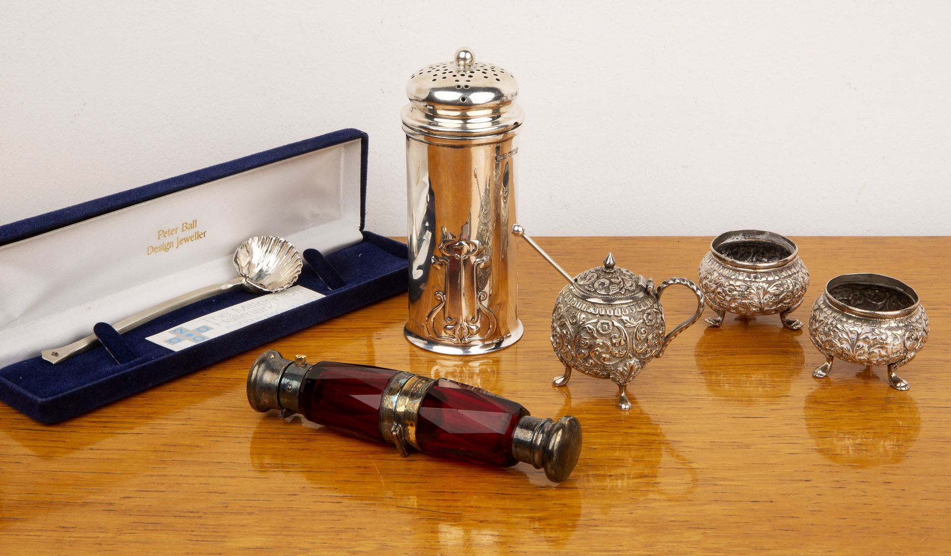 Collection of silver and silver plate to include: a white metal mounted red glass scent bottle