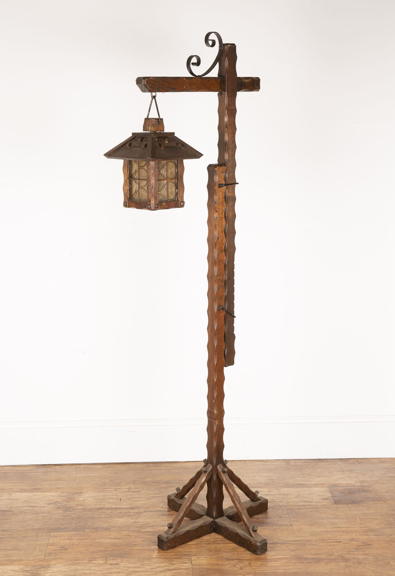 In the manner of Arthur Romney-Green (1872-1945) Arts and Crafts, oak, hanging lantern, the