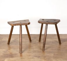 Two cutlers stools 19th Century, with elm tops, each on three legs, lighter coloured example is 50cm