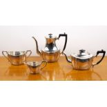 Edward VII silver four piece tea service comprising a teapot, hot water jug, cream jug and twin