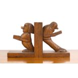 Pair of carved figural bookends oak, 1930s, modelled as two figures reading, unsigned, each