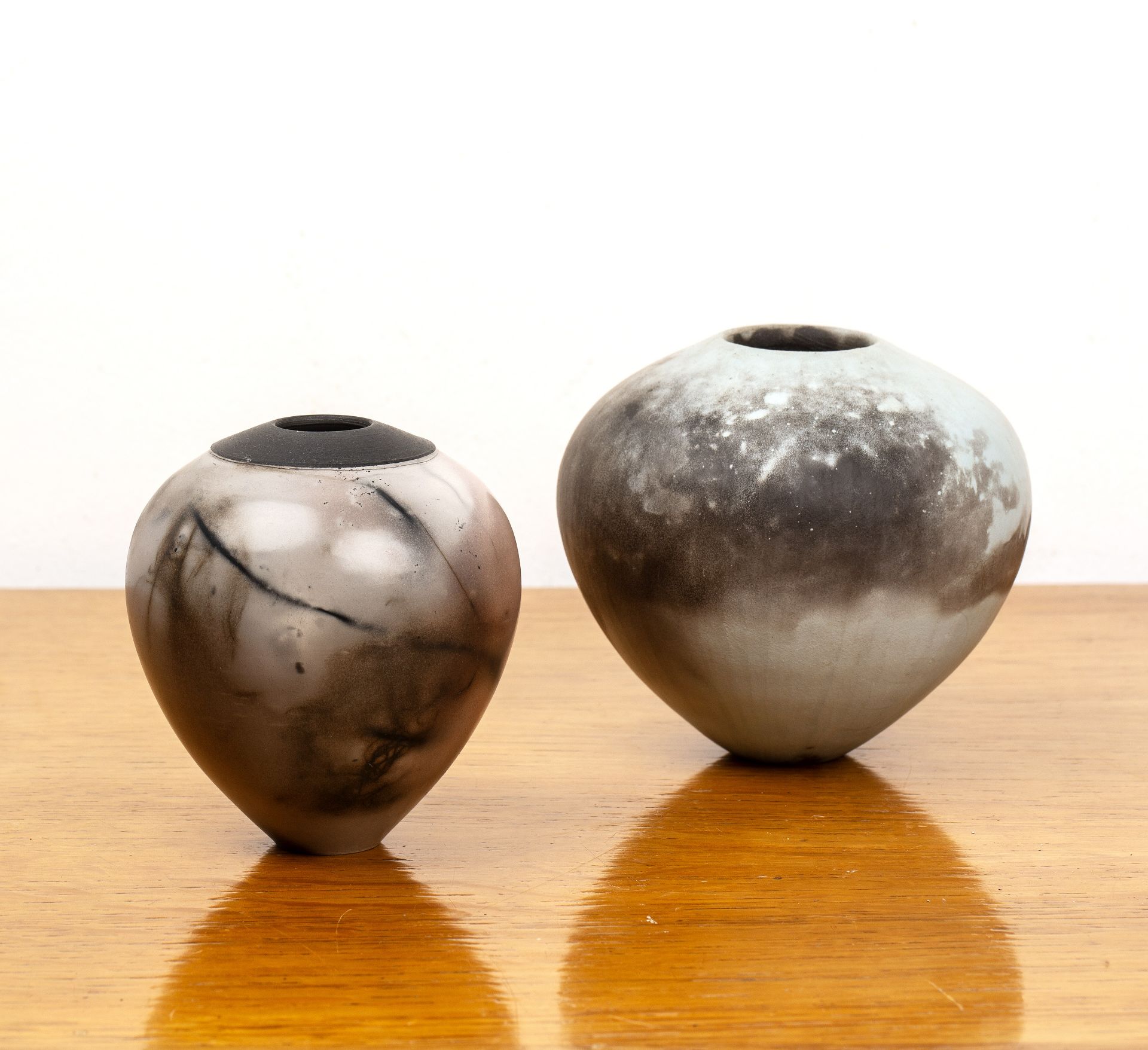 Christine Gittins (b.1948) two smoke-fired studio pottery vases, the largest example unmarked,
