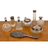 Collection of silver mounted dressing table requisites to include: handheld mirror, hobnail cut