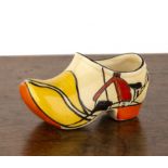 Clarice Cliff (1899-1972) 'House and bridge', model of a clog, marked to the base, 6cm high x 10.5cm