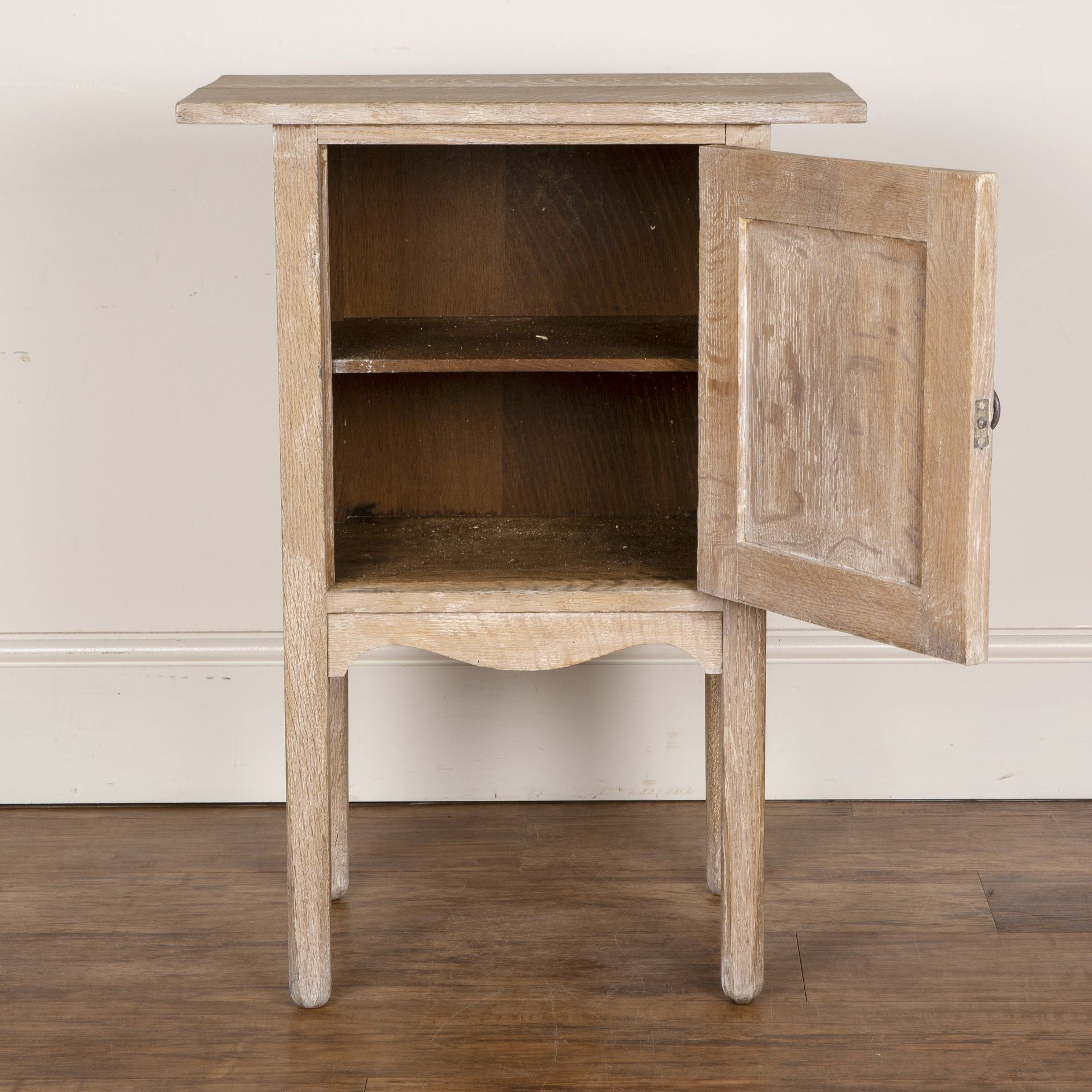 In the manner of Heals limed oak, side cupboard, with overhead top and the door with brass ring - Image 2 of 6