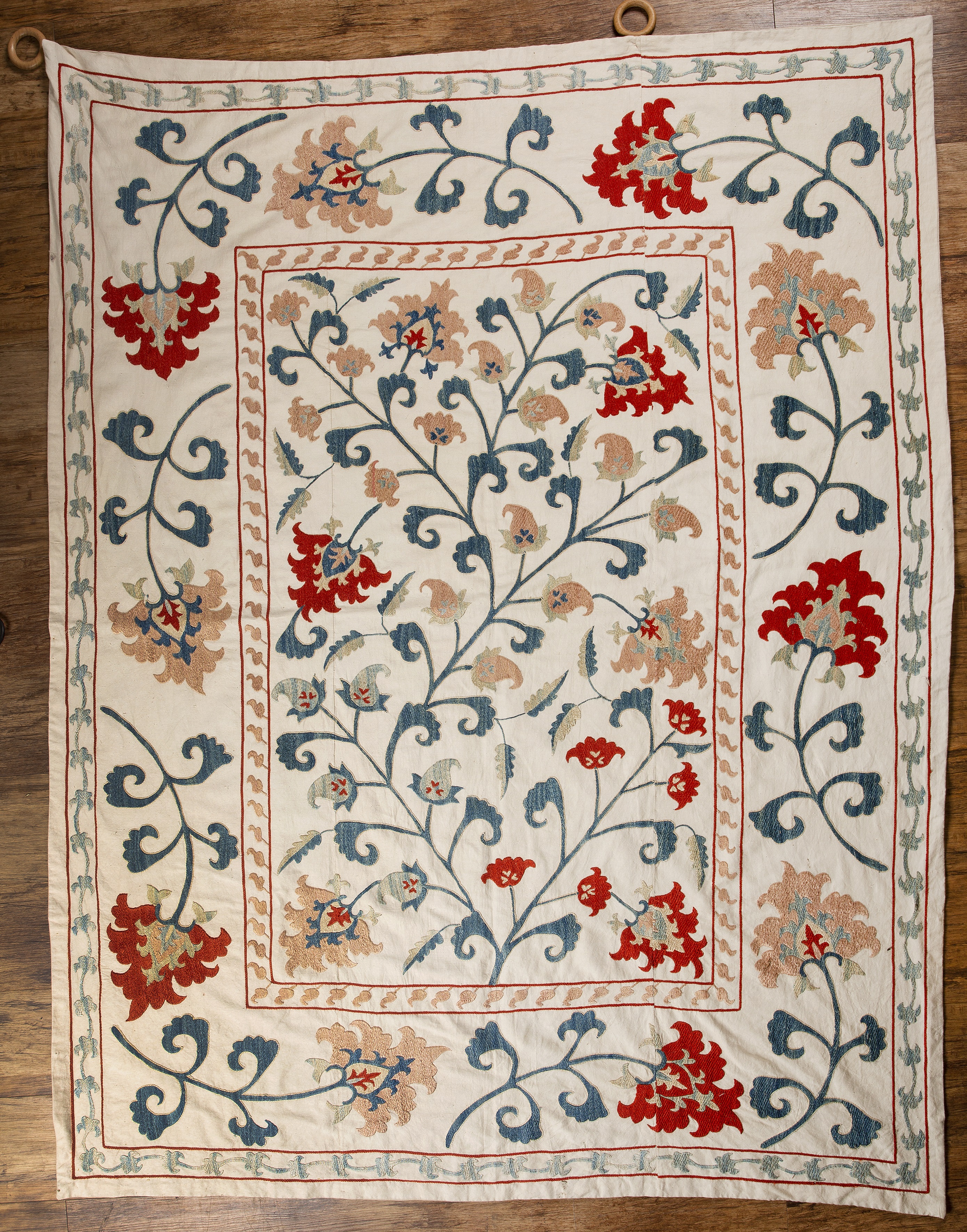 Arts and Crafts Iznik style suzani, worked with silk threads on a linen ground, unsigned, 150cm wide