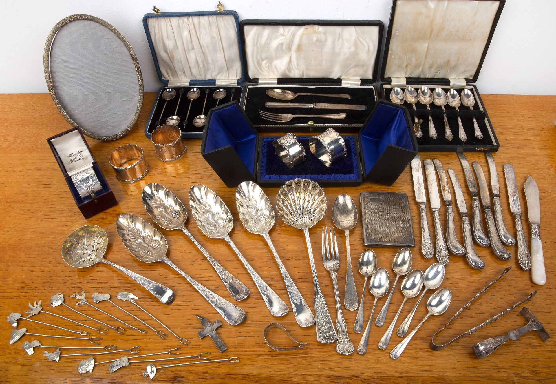Group of various silver to include: four 18th Century silver berry spoons, various napkin rings,