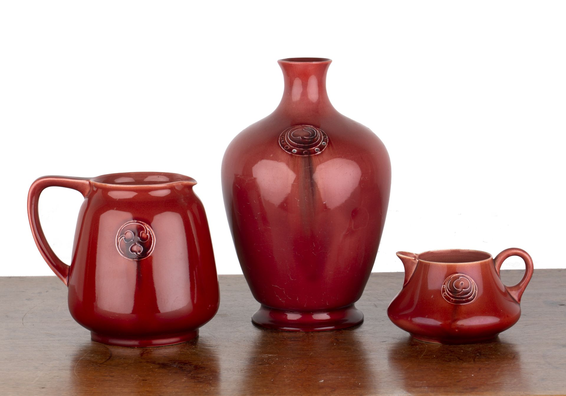 William Moorcroft (1872-1945) for Liberty and Co 'Flamminian ware' in red colourway, with foliate