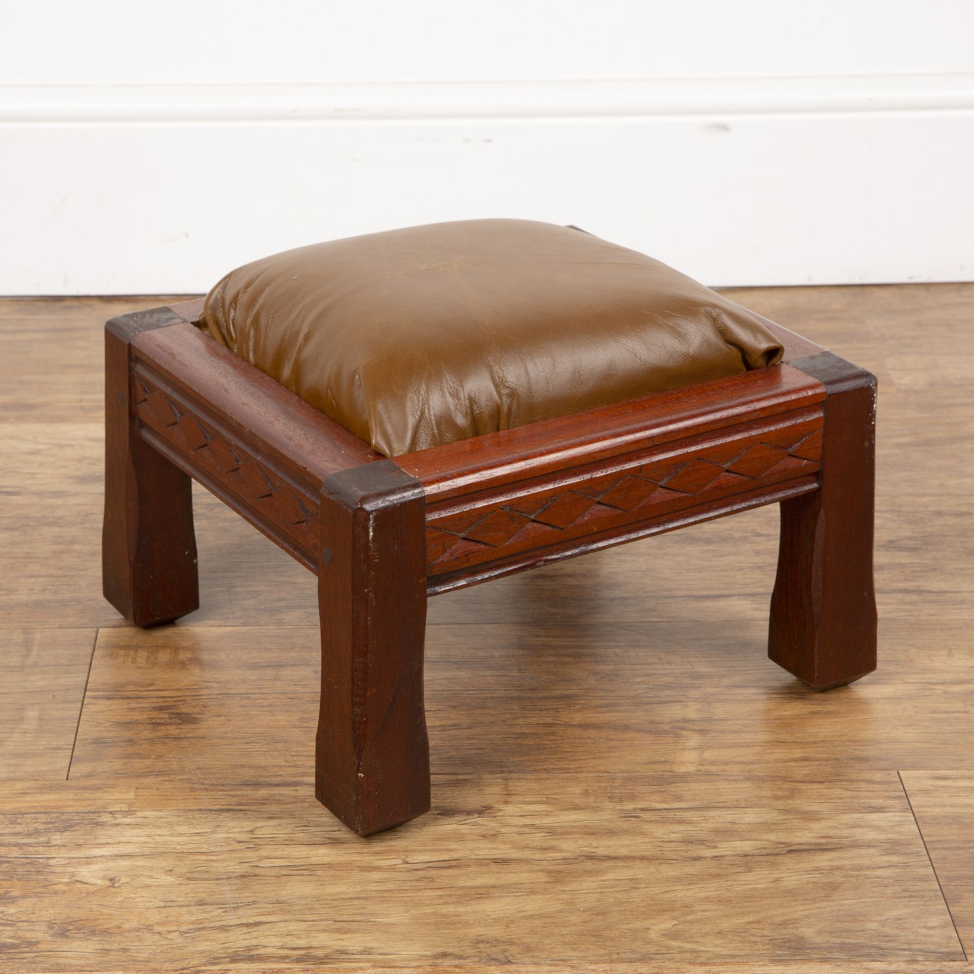 Cotswold School mahogany framed stool, with upholstered top, and carved detailing, 33cm wide x