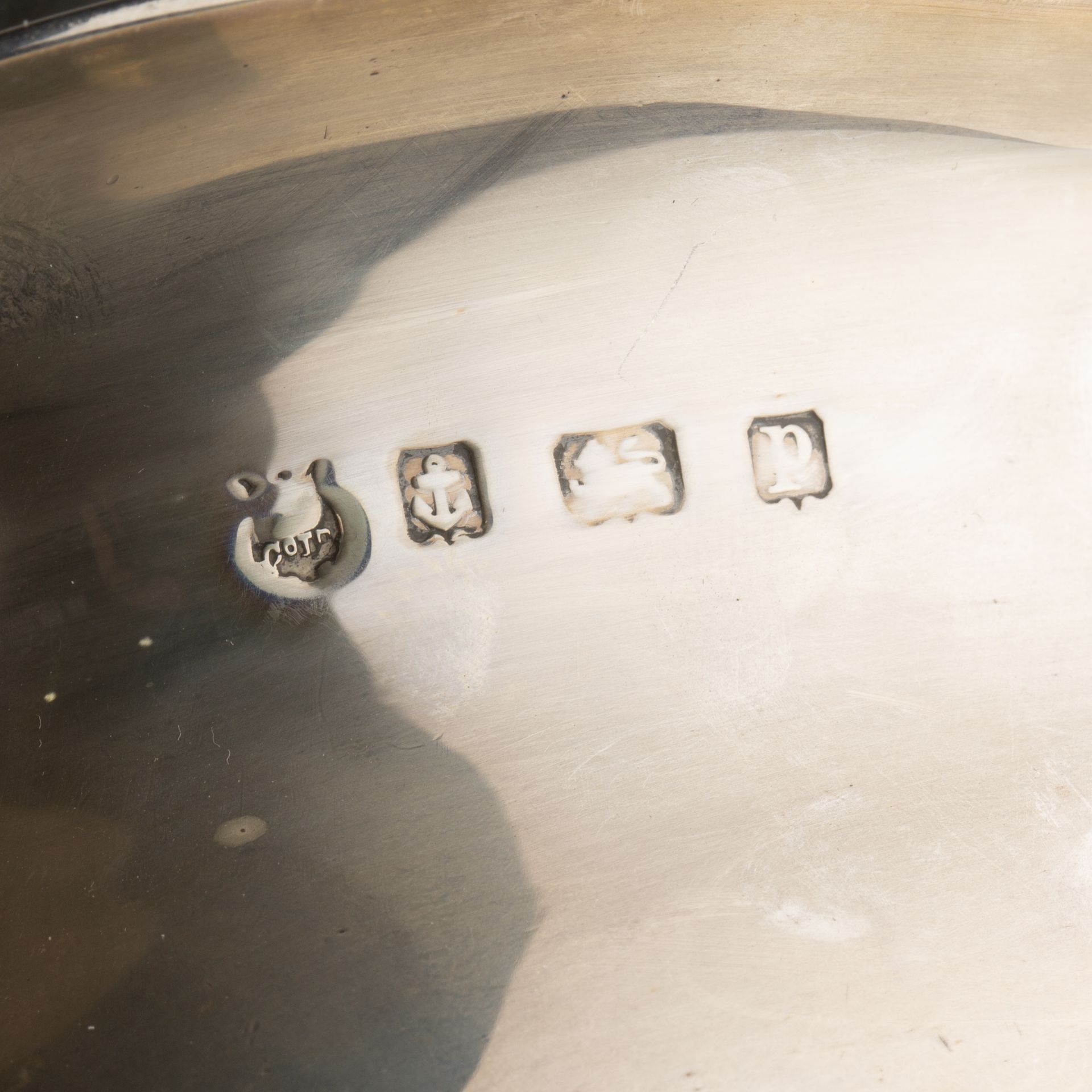 Three piece silver tea set comprising a teapot, twin handled sucrier and milk jug, all standing on - Image 3 of 5