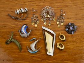 Collection of Danish jewellery comprising five silver and enamel brooches, marked 'Norway 925' to