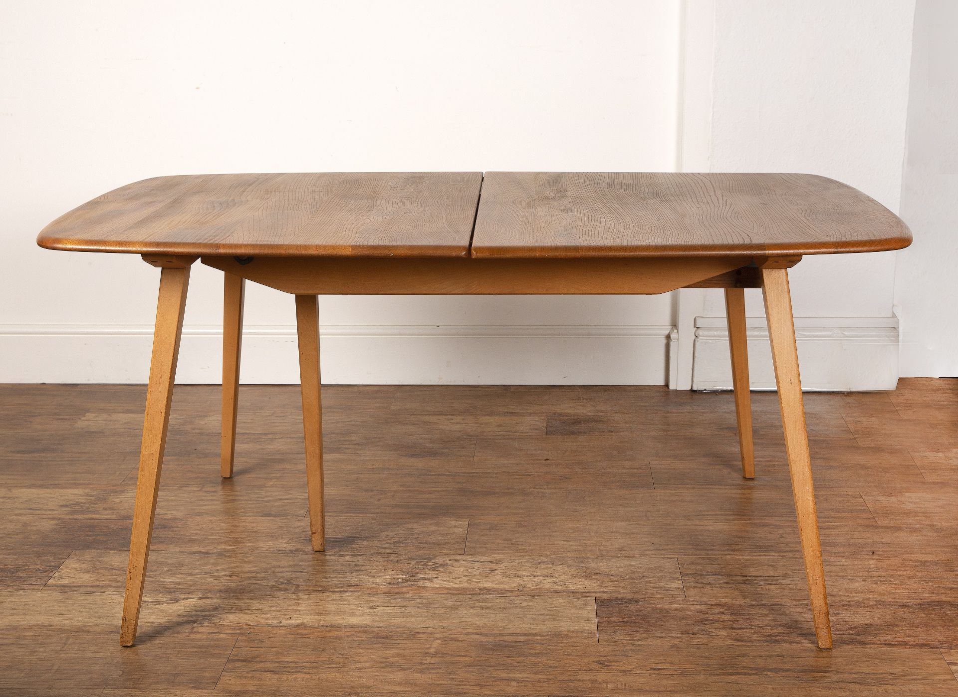 Luciano Ercolani (1888-1976) for Ercol elm and beech extending dining table and eight hoop back - Image 4 of 24