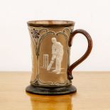 Royal Doulton Lambeth stoneware tankard, decorated with figures playing cricket in relief, impressed
