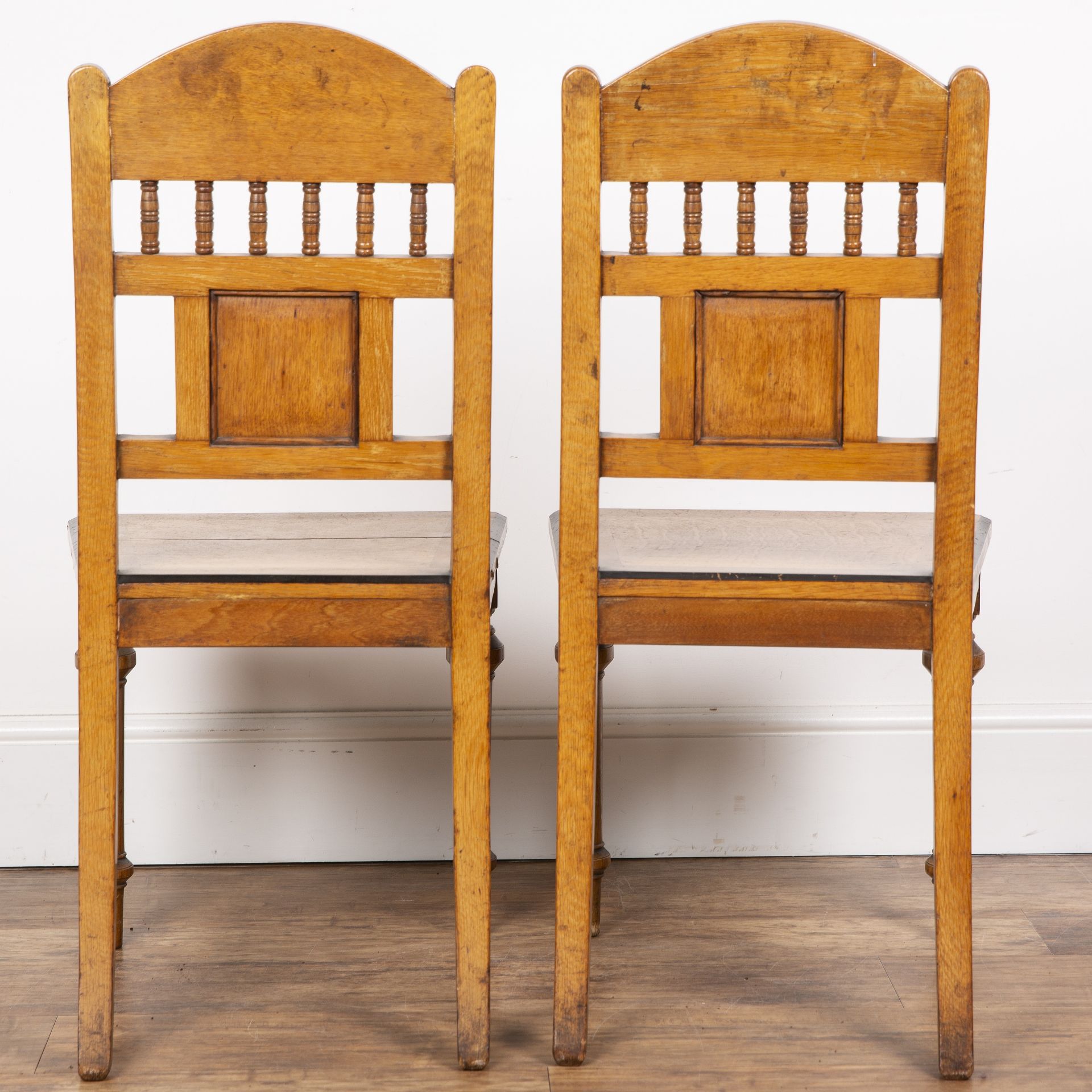 Aesthetic movement pair of oak hall chairs, with carved top rail and back supports, the seat with - Image 4 of 5