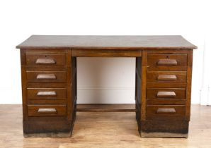 20th Century oak, kneehole desk, fitted with four drawers on either side, unmarked, 134cm wide x