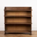 20th Century oak, open bookcase, of pegged construction detailing to either side, with four fitted