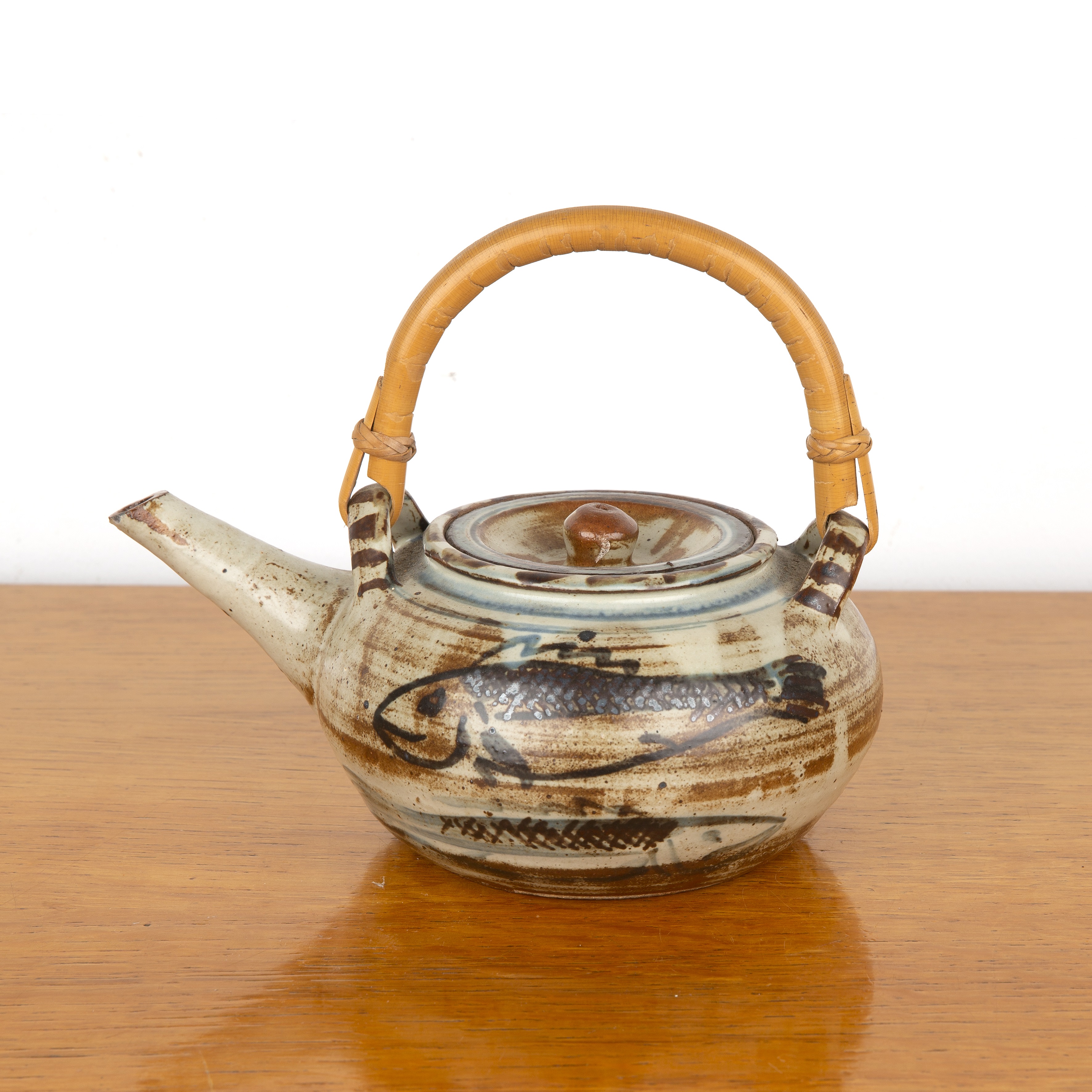 Seth Cardew (1934-2016) at Wenford Bridge studio pottery teapot, with bamboo handle, decorated