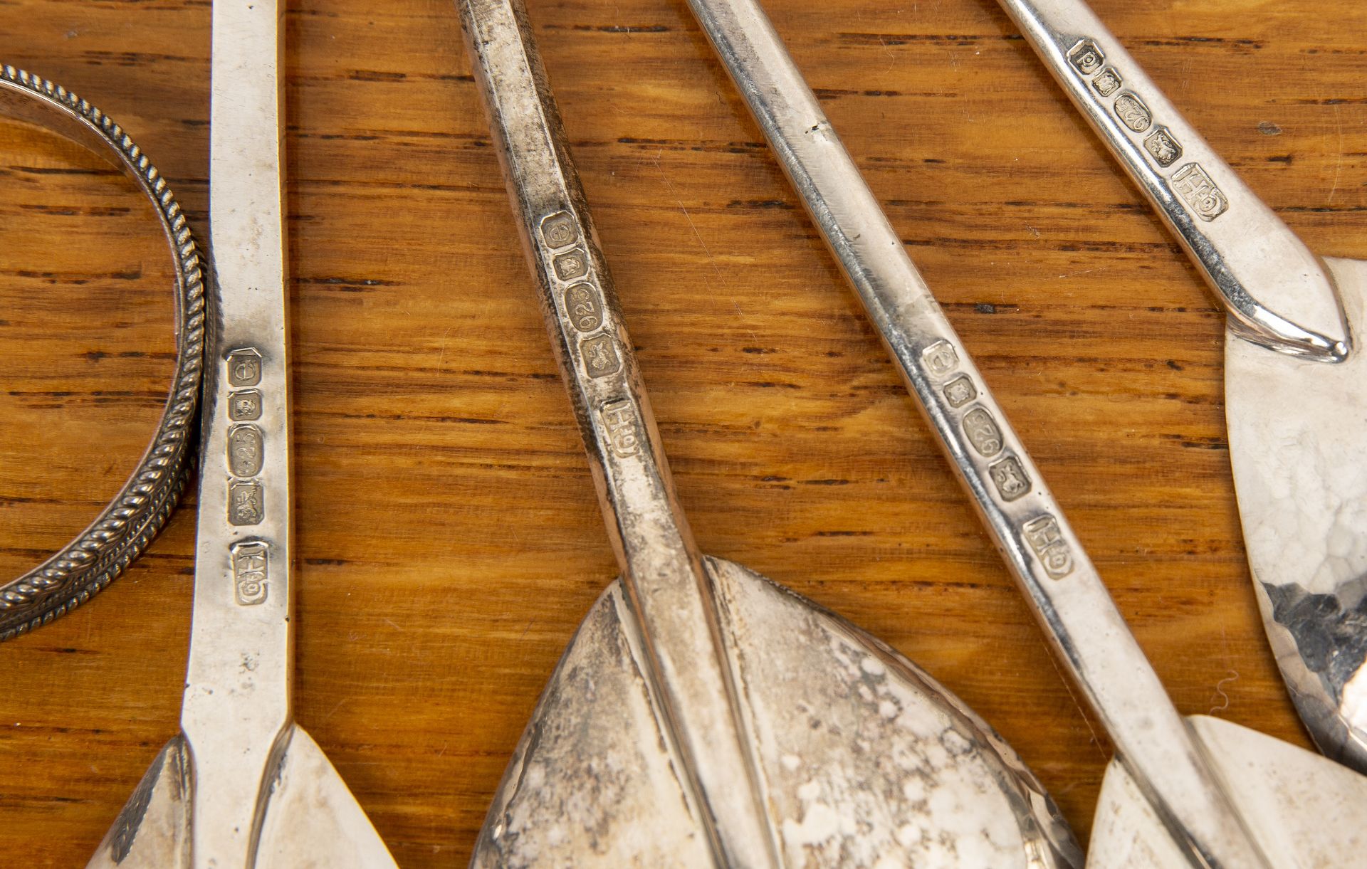 Group of silver comprising: four Guild of Handicraft seal topped silver spoons, bearing marks for - Image 2 of 2