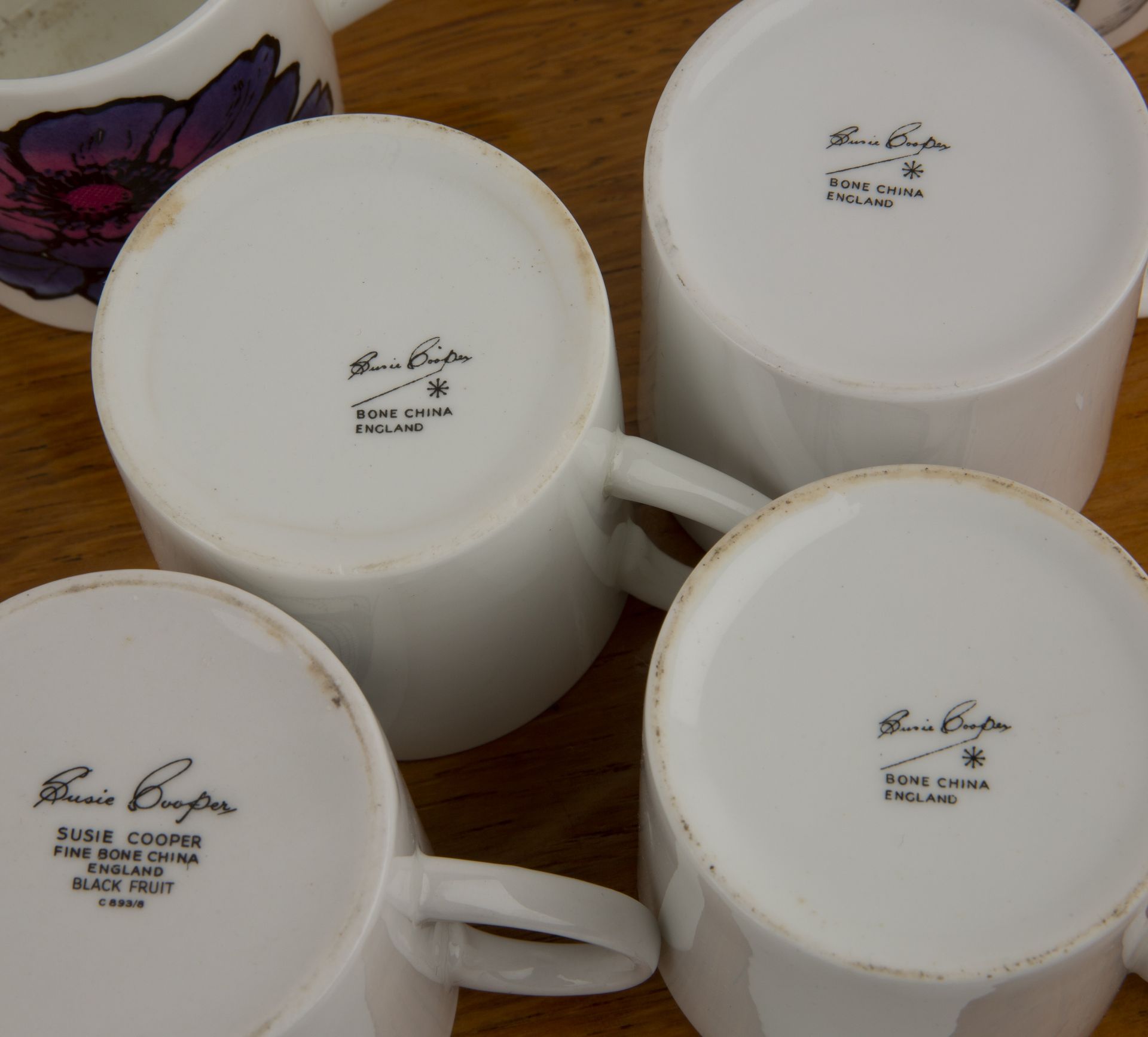 Susie Cooper (1902-1995) collection of various teacups and saucers to include 'Black Fruit' etc At - Image 2 of 5