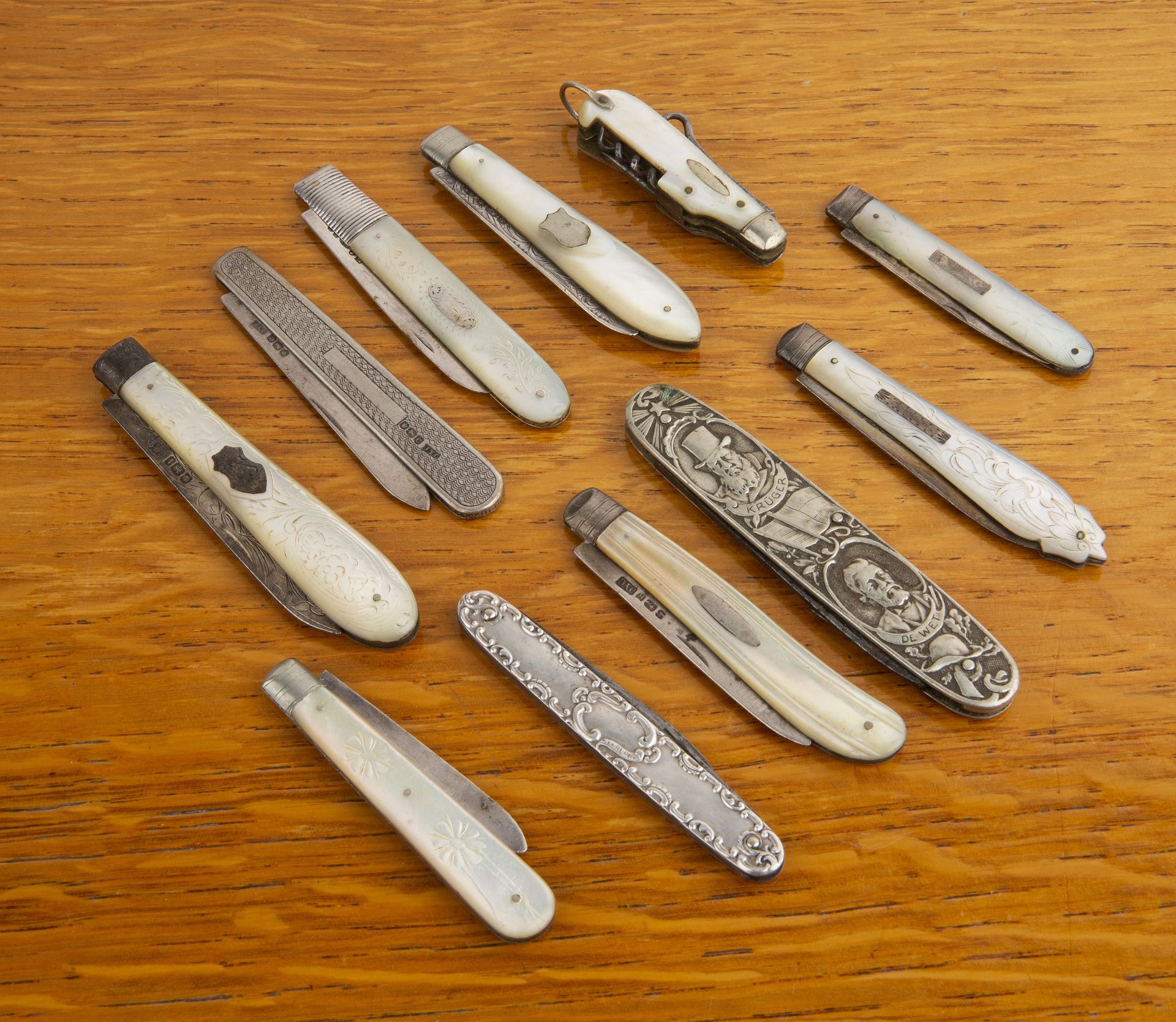 Collection of silver fruit or folding knives mostly with silver blades and mother of pearl