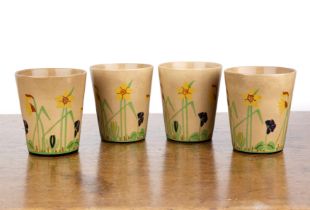 William Robinson for Ashtead Potters Four pottery beakers, with handpainted decoration of flowers,