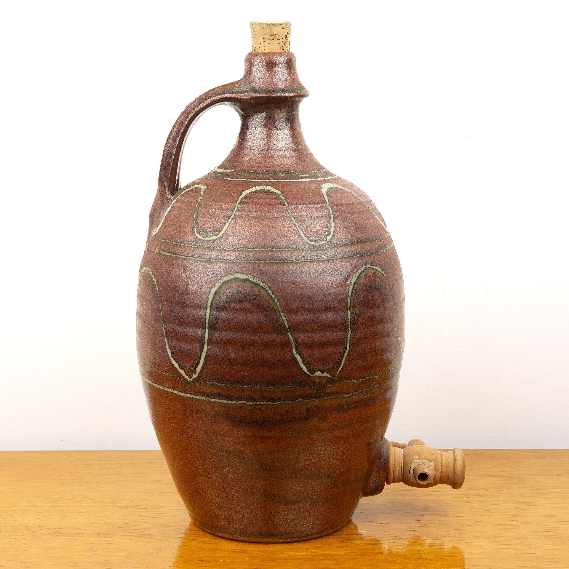 Winchcombe Pottery studio pottery cider flagon, with combed decoration, impressed mark to the