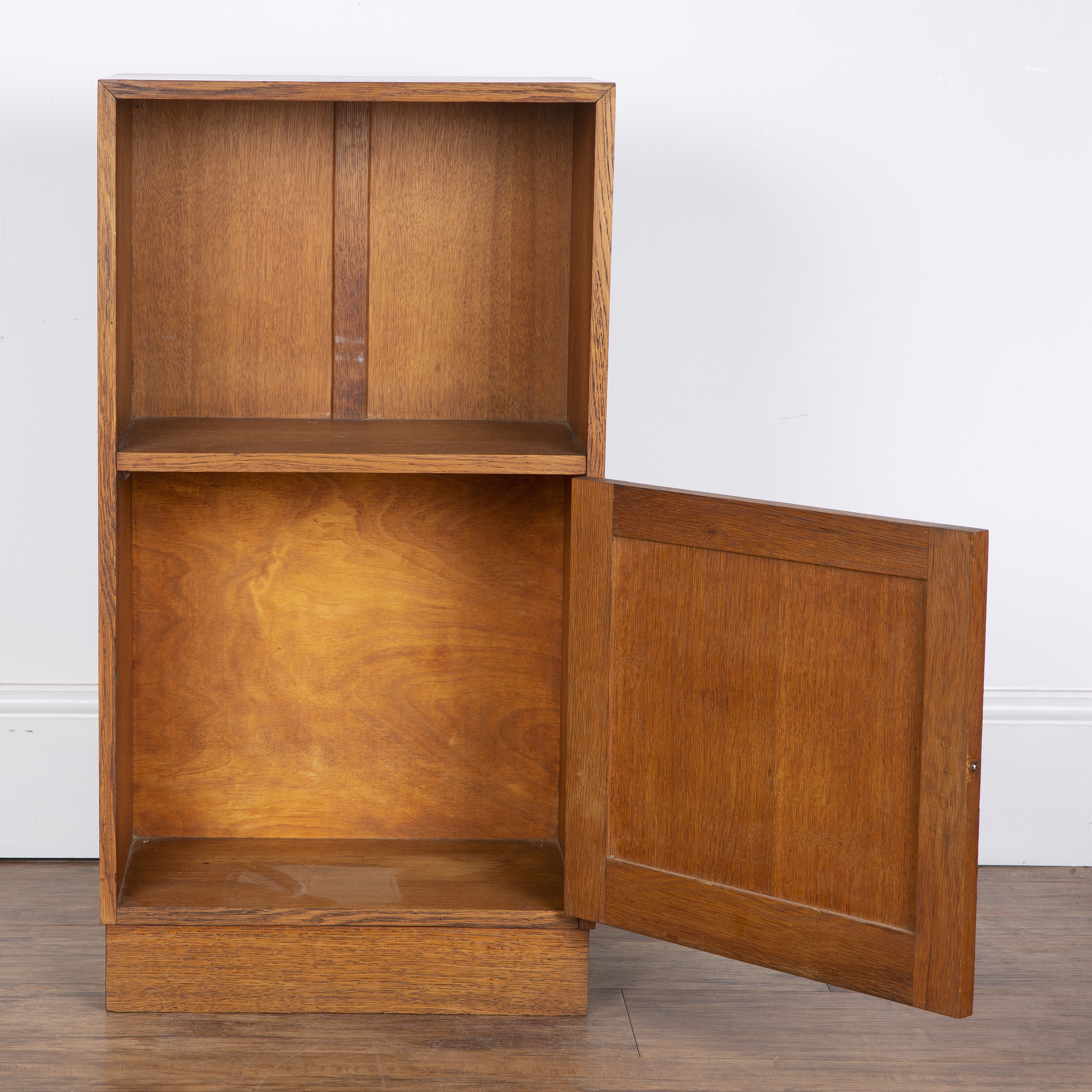 Attributed to Heals oak, small cupboard or bedside table, with open shelf above a fielded panel - Image 2 of 5