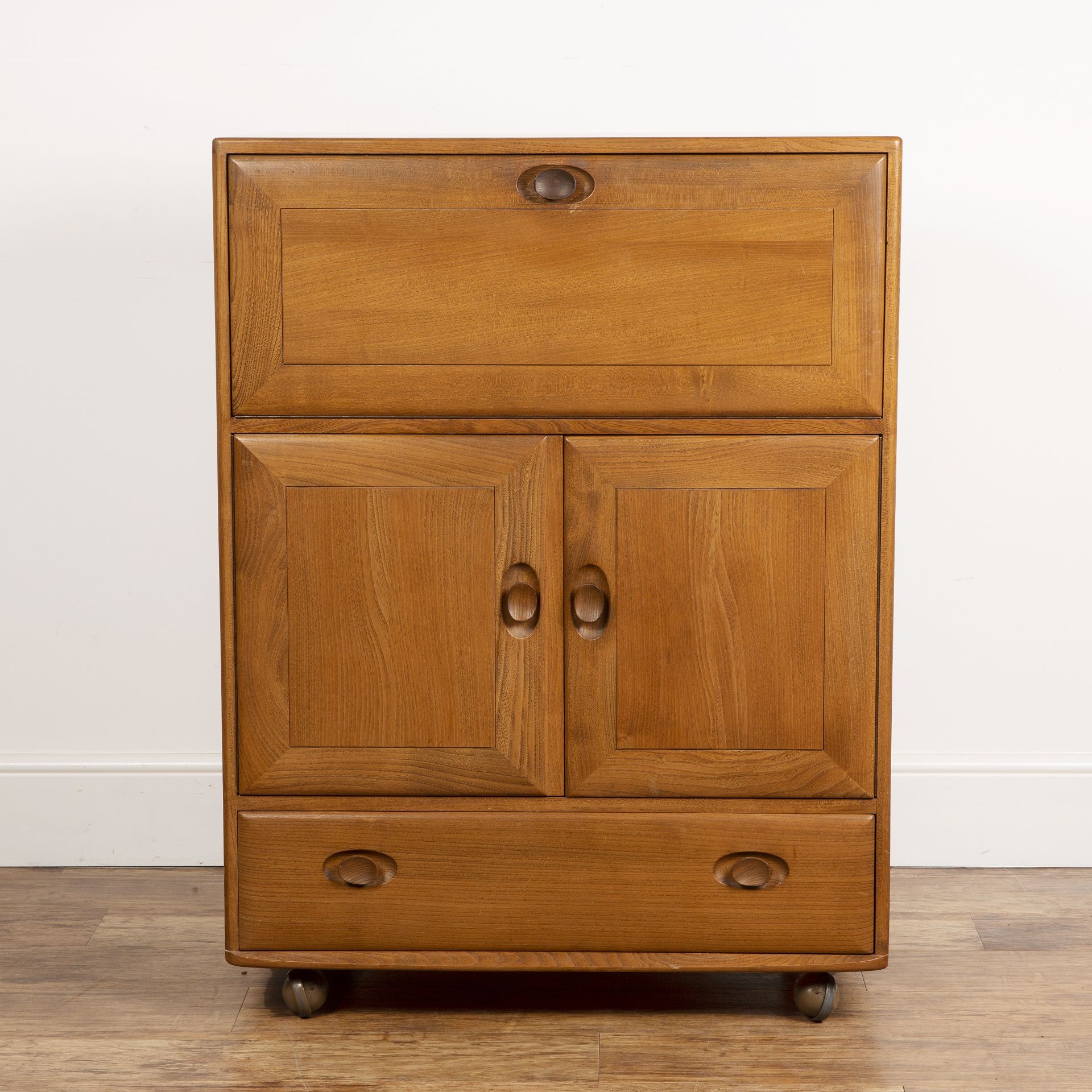 Luciano Ercolani (1888-1976) for Ercol elm, 'Windsor' model no. 469 side cabinet, with fitted