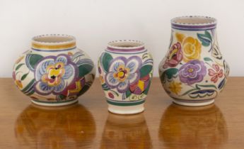 Truda Carter for Poole Pottery Three ceramic vases decorated with stylised flowers by Hilda Hampton,