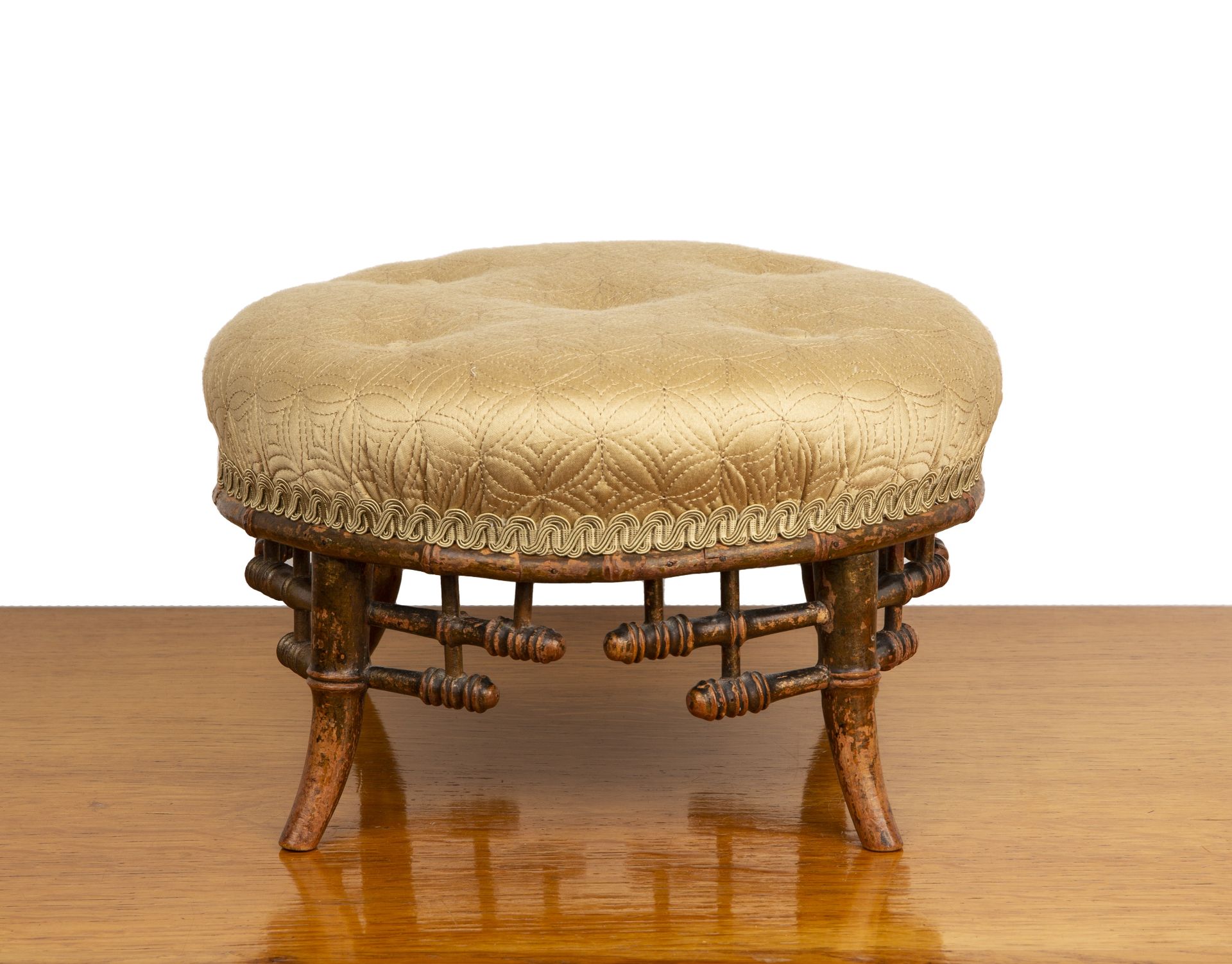 In the manner of Edward William Godwin (1833-1886) small footstool, yellow button upholstered top on