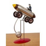 Attributed to Authentic Models 'Tesla' kinetic counterbalance toy, in the Folk Art style,