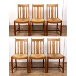 Attributed to Heals oak, set of six chairs dining chairs, circa 1920, having rail backs and drop-