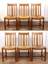 Attributed to Heals oak, set of six chairs dining chairs, circa 1920, having rail backs and drop-