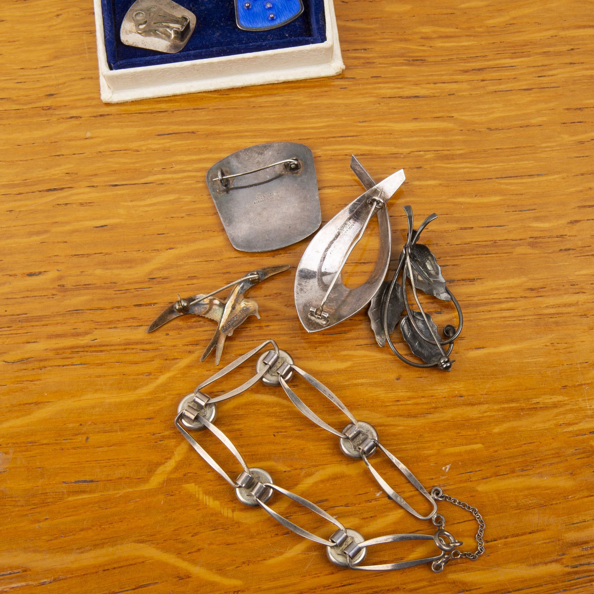 Group of jewellery comprising: a white metal and faux opal panel bracelet, stamped 835, a David - Image 2 of 3
