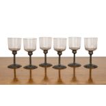 Orivit set of six Art Nouveau drinking glasses on pewter stems, the bowls with cut decoration,