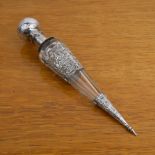 Dutch conical scent bottle 19th Century, facet cut glass with unmarked silver repoussé lid and