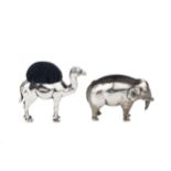 An Edwardian silver novelty pincushion, modelled as a camel, maker's mark worn, Birmingham 1907, 5.