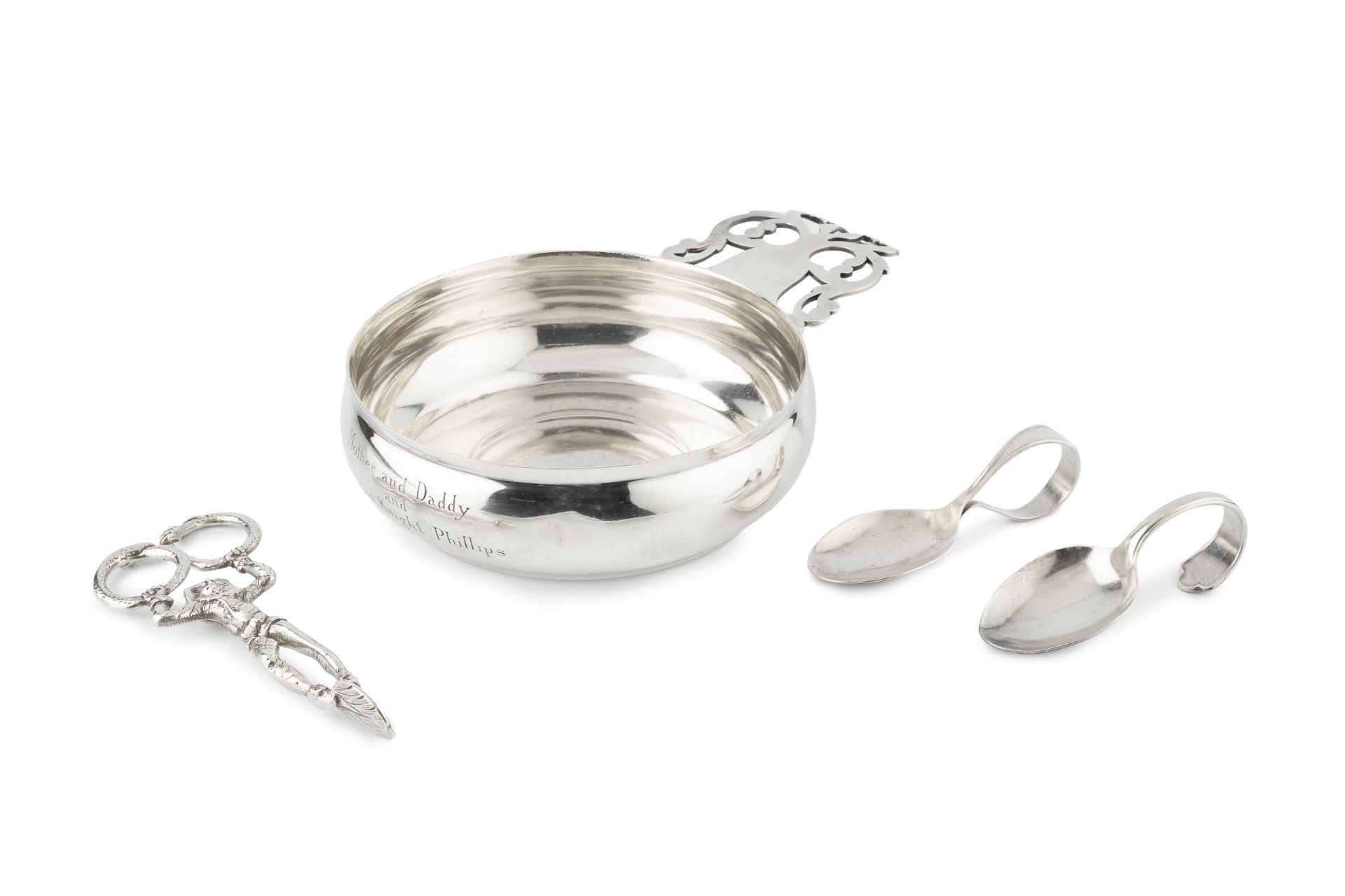 An American silver porringer by Tiffany & Co, with pierced handle, after the original design by Paul