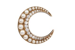 A late Victorian diamond and pearl crescent brooch, set with 19 graduated old cut diamonds and 23