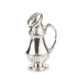 An Edwardian silver Arts & Crafts sugar castor, having angled hinged pierced cover with latch, the