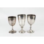 A mid Victorian silver trophy goblet, engraved with stylised foliage and with presentation