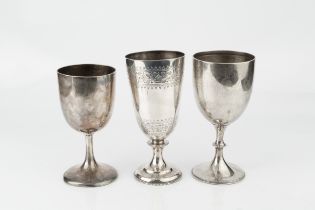 A mid Victorian silver trophy goblet, engraved with stylised foliage and with presentation